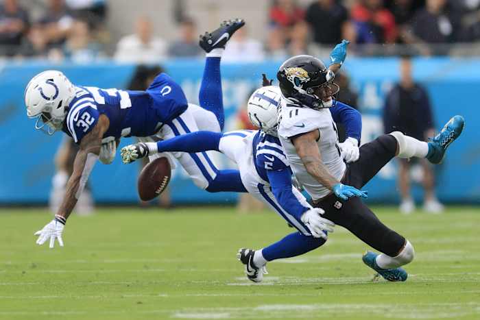 Indianapolis Colts safety Julian Blackmon (32) nearly intercepts along with cornerback Stephon Gilmore (5) against Jacksonville Jaguars wide receiver Marvin Jones Jr. (11) during the second quarter of a regular season game Sunday, Sept. 18, 2022 at TIAA Bank Field in Jacksonville.
